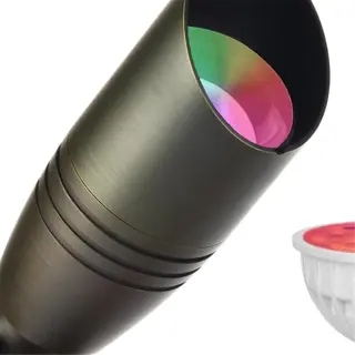 a colorful led ground spotlight with interchangeable rgb bulbs for vibrant outdoor lighting