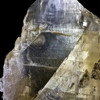 a large, translucent gypsum crystal with intricate growth patterns