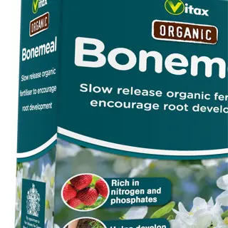 a package of organic bonemeal fertilizer with descriptive text and images of plants