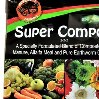 a package of super compost mix, labeled with its ingredients and benefits for gardening, including larger yields and safe use
