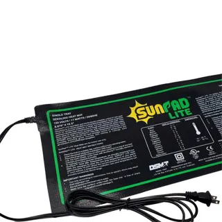 a sunpad lite seedling heat mat with detailed instructions and a power cord