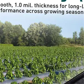 advertisement for durable black plastic mulch with farmland background