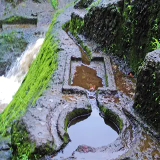 ancient stone water management system with well and channels