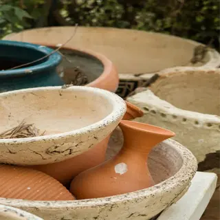 assorted terracotta pots and planters in various sizes and shapes