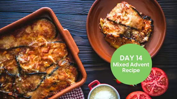 baked eggplant parmesan in a clay casserole dish and serving plate, featuring 'day 14 mixed advent recipe' text with fresh tomatoes and grated cheese