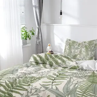 bedroom with botanical-themed bed sheets and plant cover design