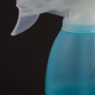 blue spray bottle with liquid soap formula