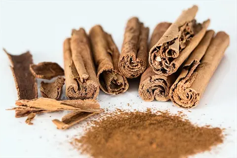 cinnamon sticks and powdered cinnamon - natural cinnamon powder ants deterrent for kitchen pest control