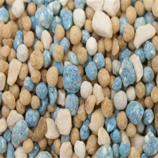 close-up of multi-colored slow-release fertilizer pellets