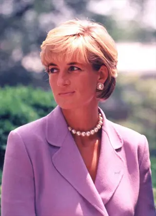 close-up portrait of pretty lady diana in lavender blazer and pearl necklace