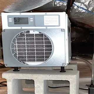 humidity control unit installed in a crawl space