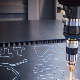laser cutting machine in action on a metal surface