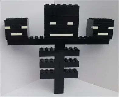 lego minecraft black wither model with three blocky heads resembling smoke bush