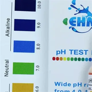 ph test kit with color chart and liquid bottle