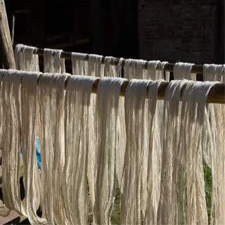 yarn drying on a clothesline, part of the drying process